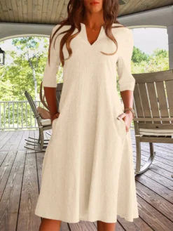 Women Solid Notched Neck Slant Pocket Half Sleeve Dress